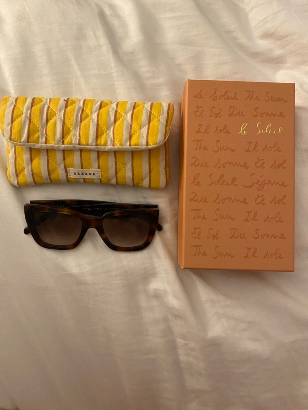Sezane Tortoiseshell Sunglasses with Yellow-Striped Quilted Case